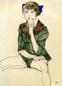 Sitting Woman in a Green Blouse